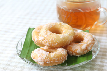 Malaysian traditional Fried donuts coated with icing sugar