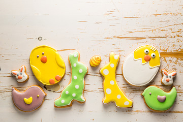 Easter cookies on white wood background