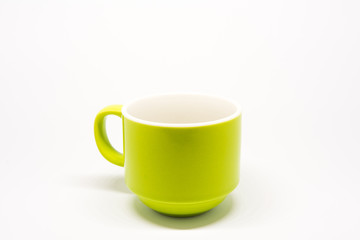 green mug coffee on white background