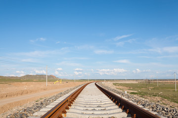 Fototapeta na wymiar railway in the prairie