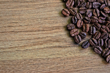 Coffee beans on a wooden table