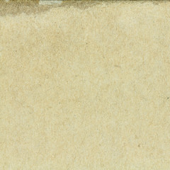 Recycled brown paper texture or paper background. Closeup light brown paper detail for design with copy space for text or image.