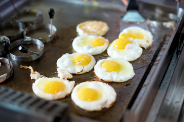 Sunny side up eggs on grill