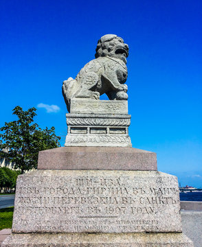 Statue of  Chinese Lions "Shih Tzu" often called "Foo Dogs" at The Petrovskaya embankment. Saint-Petersburg, Russia