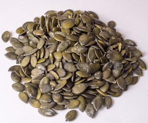 pumpkin seeds on white background