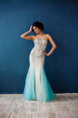 Fototapeta premium Fashion photo of beautiful lady in elegant evening dress