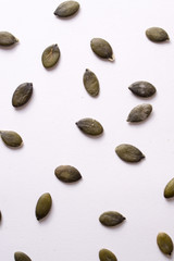 pumpkin seeds on white background