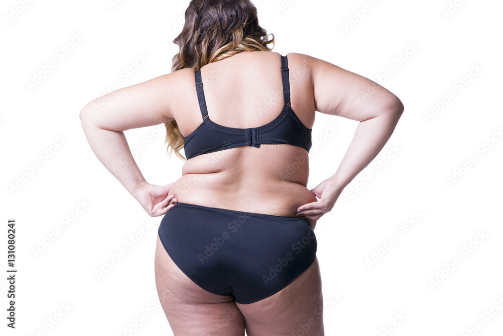 Wall mural Plus size model in black lingerie, overweight female body, fat woman with cellulitis on buttocks isolated on white background