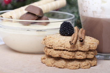 Hot chocolate in a cup and biscuits
