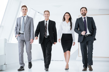 Full length Business people walk in office