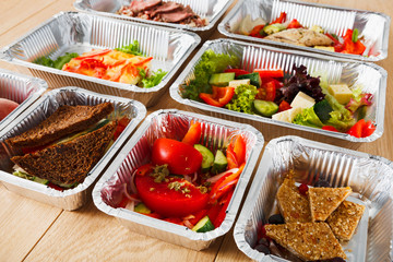 Healthy food in boxes, diet concept.