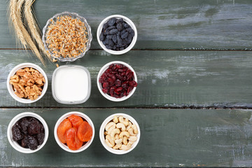 Yogurt on the table with different ingredients, snack