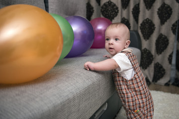 Fototapeta na wymiar Baby and balloons