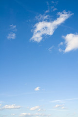White clouds in blue sky. Beautiful coudscape over horizon.