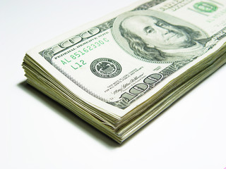 Cash. Money. US dollars. 100 dollar bills. one hundred dollar bills. paid.