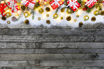 Christmas gift boxes placed on wooden planks