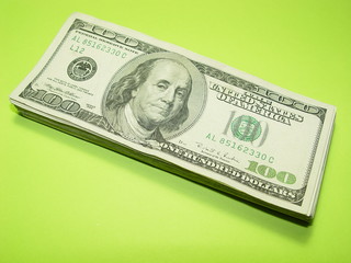 Cash. Money. US dollars. 100 dollar bills. one hundred dollar bills. paid.