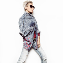 Denim fashion. Fashionable denim shirt. Stylish blonde with shor