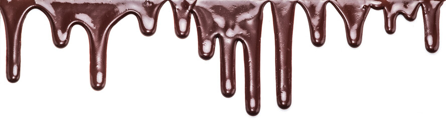 Flowing chocolate drops or drops of chocolate glaze isolated on