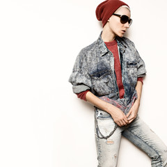 Model Tomboy hipster concept Blue denim clothes Stylish fashion