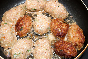 cutlets fried in a pan