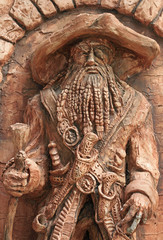 stone sculpture of one-eyed pirate outdoor in Khosta, Russia