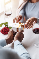 Overwhelmed African American woman getting the present