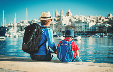 father and son looking at city of Valetta, Malta