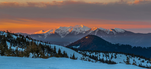 sunrise scene in winter mountains
