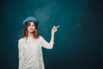 girl in blue hat, girl holding hat