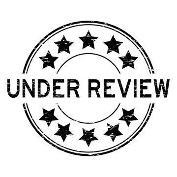 Grunge black under review with star icon round rubber stamp