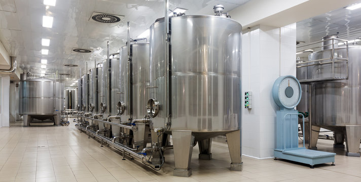 Interior of modern wine plant with stainless equipment