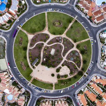 Aerial view of traffic circle and city