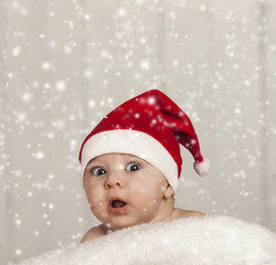 Happy baby in santa hat