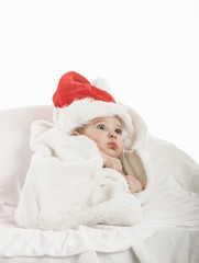 Happy baby in santa hat