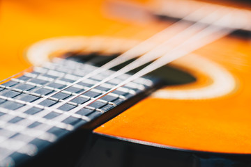 Fototapeta premium Detail of classic guitar with very shallow depth of field