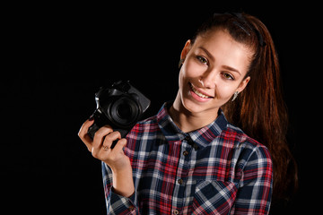 Young girl with a camera