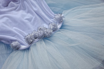 Macro view of sewing dresses. Close Up of fabric mesh for Tutu. Children's dance skirt. Net wedding textile.