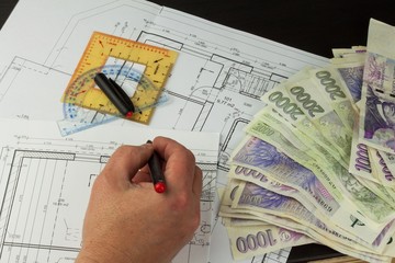 Money to build a house. Mortgage installment. Valid Czech banknotes. Part of architectural project, architectural plan, technical project, construction plan. 
