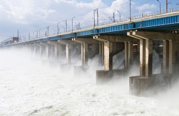 Fototapeta na wymiar Reset of water at hydroelectric power station on the river