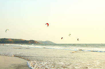 People ride on Kitesurf at sea 