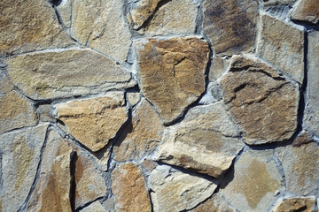abstract wall background with many different stones