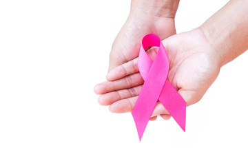 Woman hand hold pink ribbon on white background ,Awareness breas