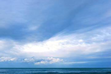 Naklejka na ściany i meble Sea waves. Cloudy weather. Baltic sea. Clouds in the sky.