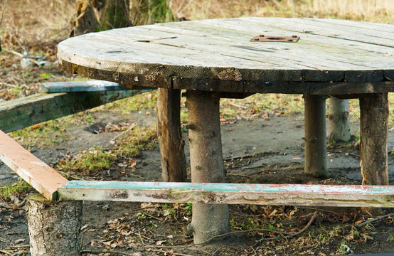 Handmade, table in the woods. Round table on the street. - Powered by Adobe