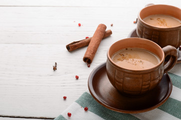 masala with spices on a white wooden table