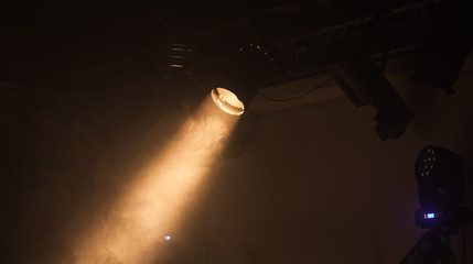 Ray of scenic spot light over dark