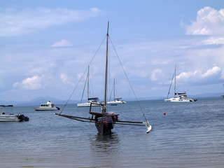 NOSY BE , MADAGASCAR, NOVEMBER 2.2016,  Ships in a picturesque bay Indian Ocean, Nosi Be, Madagascar,  November 2. 2016,