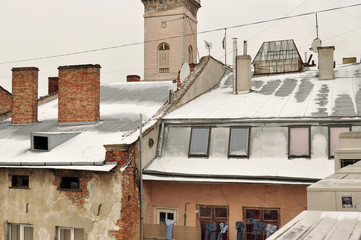 Old buildings and snow-covered roofs of the downtown in Lviv, Ukraine.