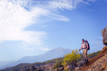 Hiking in the mountains in the summer on a sunny day.
